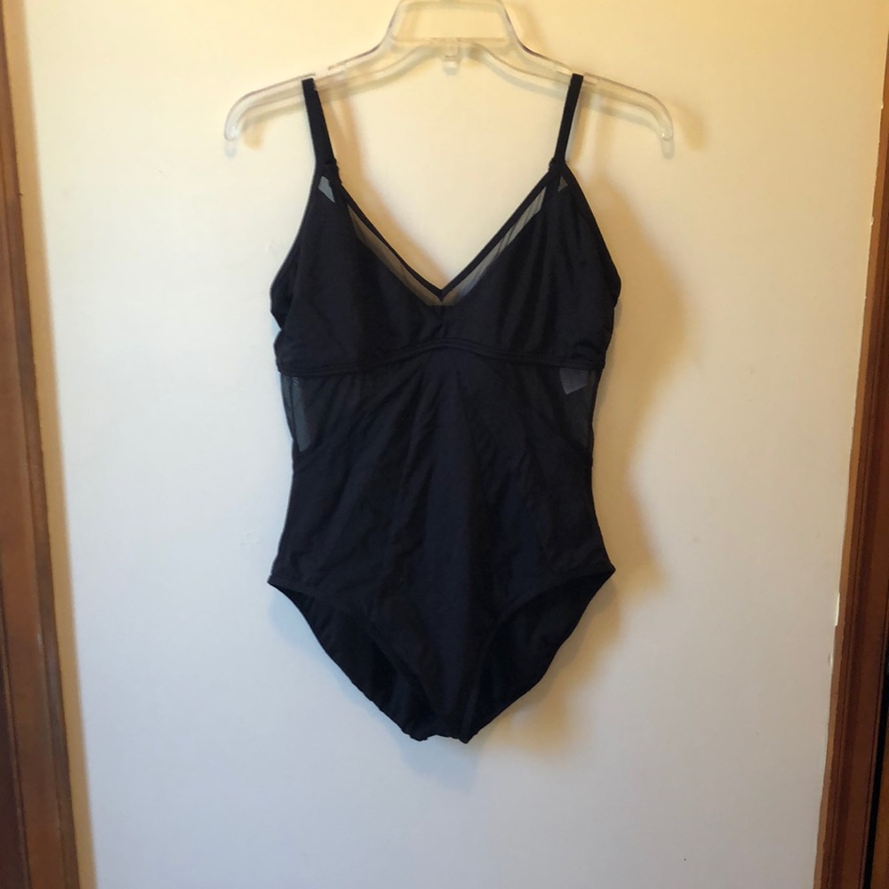 Black swimsuit with mesh cutouts
